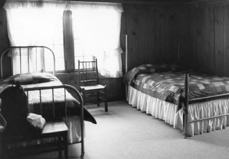 guest room in old house section of old faithful inn
